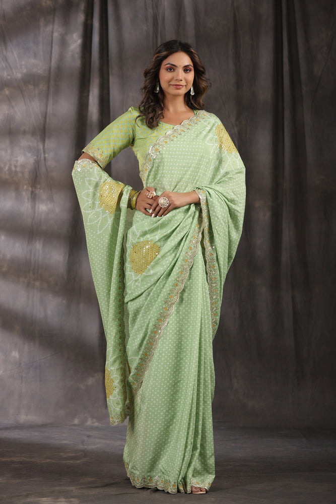 Green Muslin Saree - Exquisite Bandhani Print with Mesmerizing Hand Mirror Work and Artistic Mirror Scallop Border