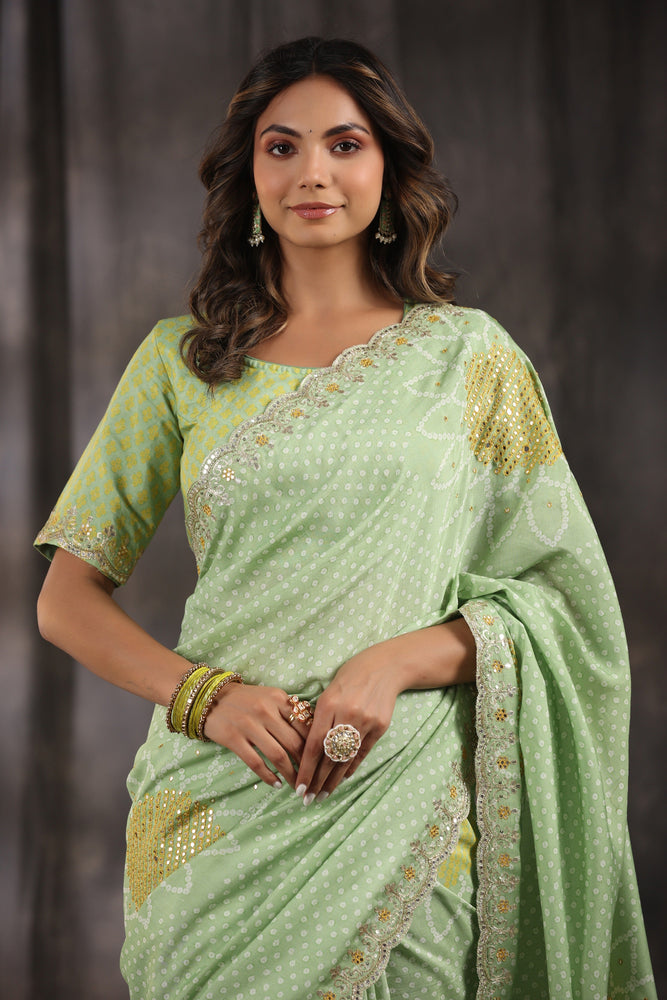 Green Muslin Saree - Exquisite Bandhani Print with Mesmerizing Hand Mirror Work and Artistic Mirror Scallop Border