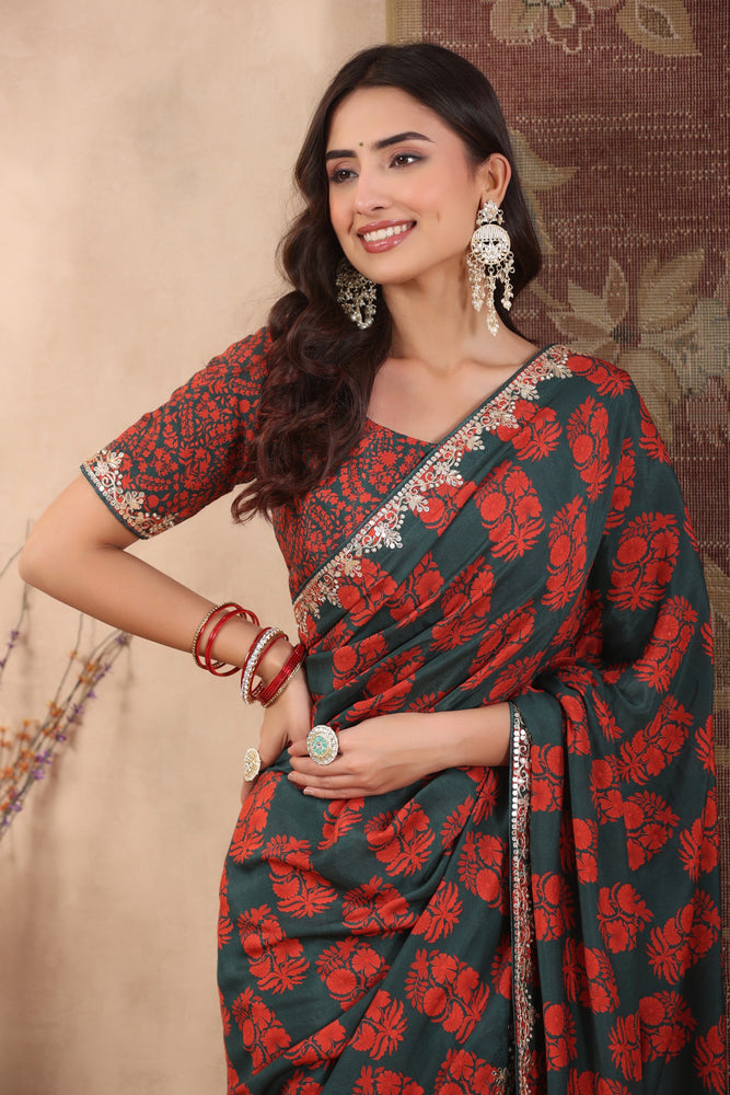 Graceful Green and Red Muslin Saree with Traditional Print and Hand Embroidered Mirror and Dabka Work