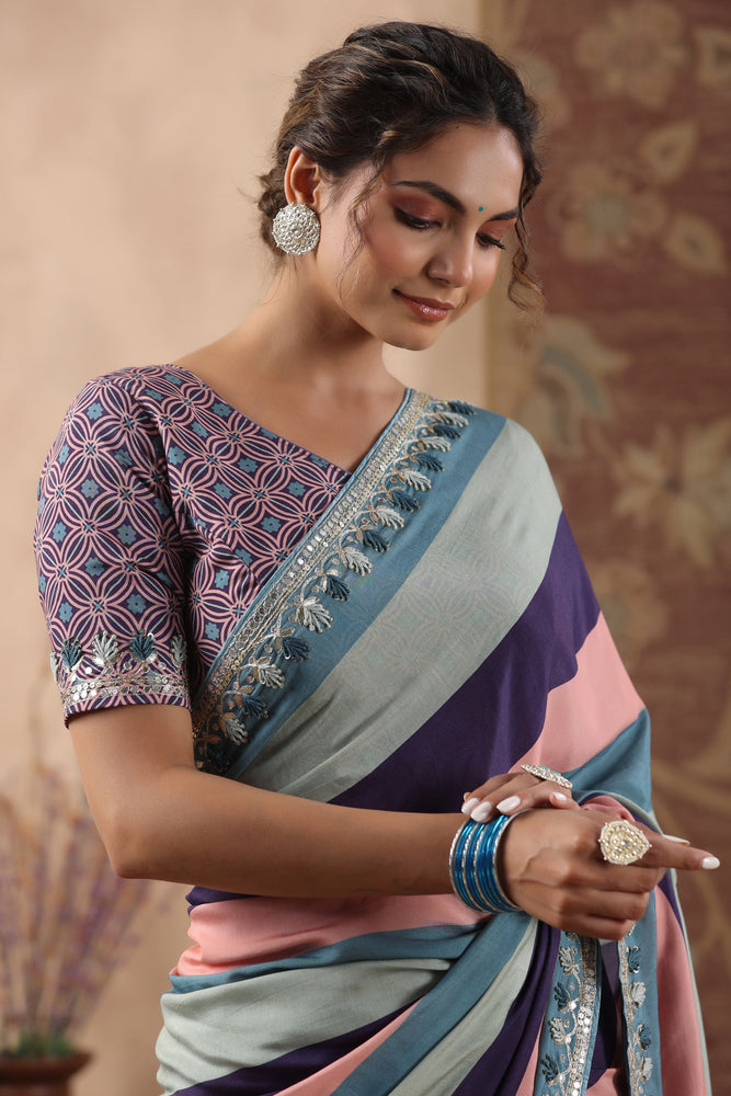Embrace Vibrancy with Multicolored Muslin Saree - Artistic Embroidery and Luxurious Comfort.