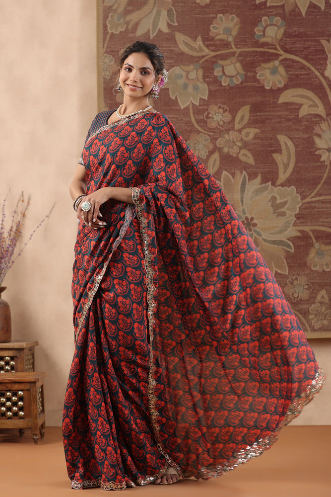 Experience Beauty in Contrast with Blue and Red Muslin Saree.