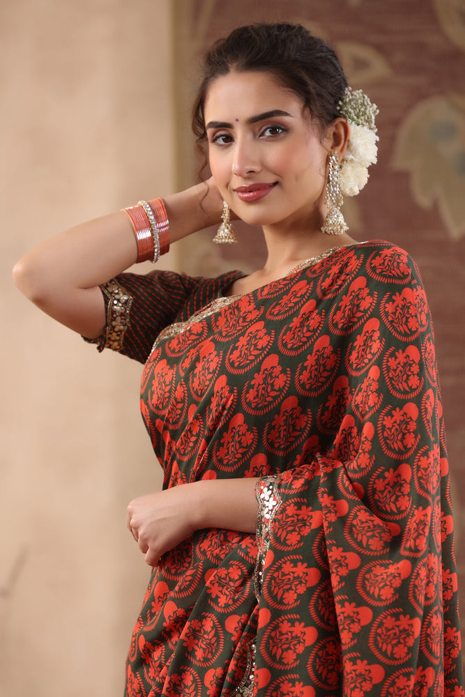 Embrace Nature's Charm with Green and Red Muslin Saree.