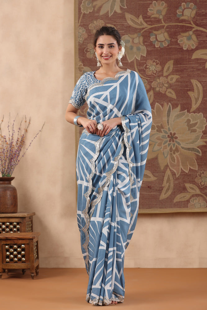 Elevate Your Style with Cream and Blue Muslin Saree.