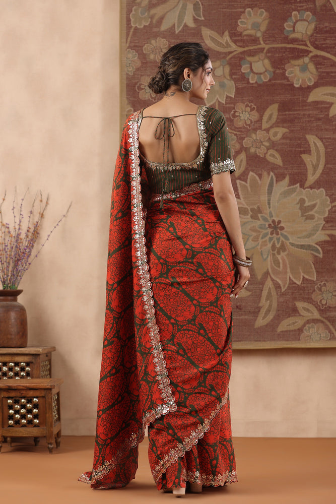 Elevate Your Style with Green and Red Muslin Saree.
