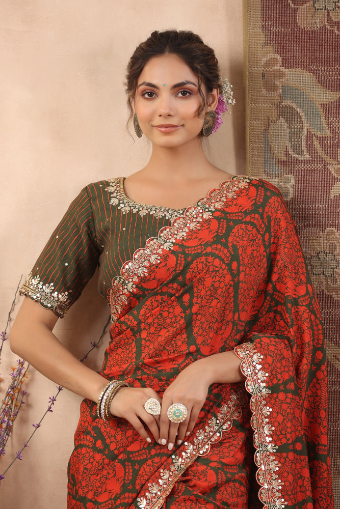 Elevate Your Style with Green and Red Muslin Saree.