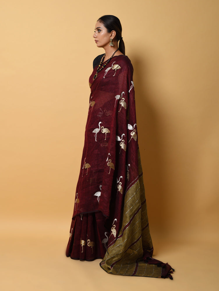Maroon Linen Saree with Zarri Embroidery and Figure Motives All Over