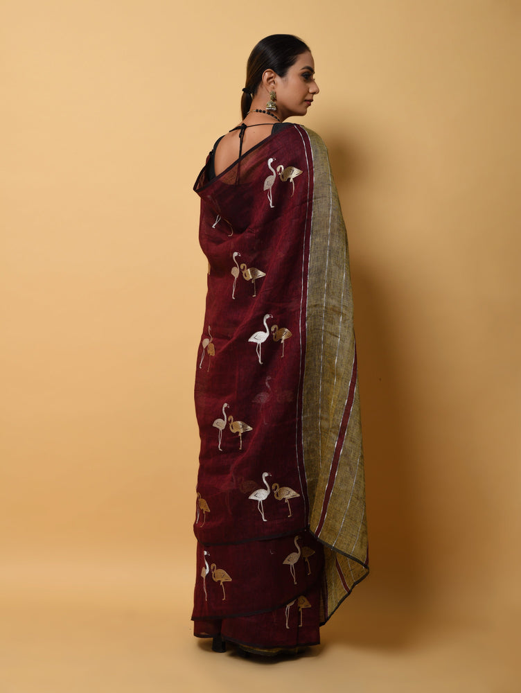 Maroon Linen Saree with Zarri Embroidery and Figure Motives All Over