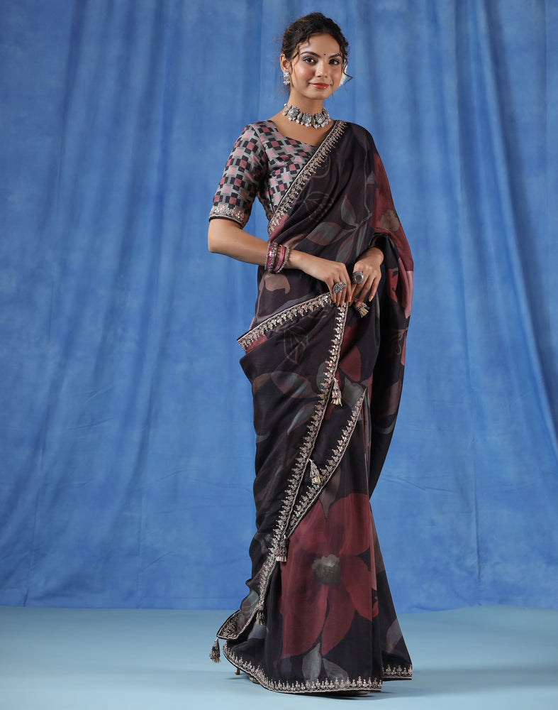 Stunning Brown Muslin Saree with Bold Flower Prints and Sequence and Ari Border