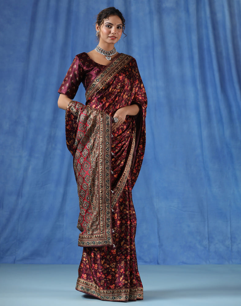 Maroon Satin Crepe Saree with Traditional Flower Prints and Handcrafted Aari Work Border